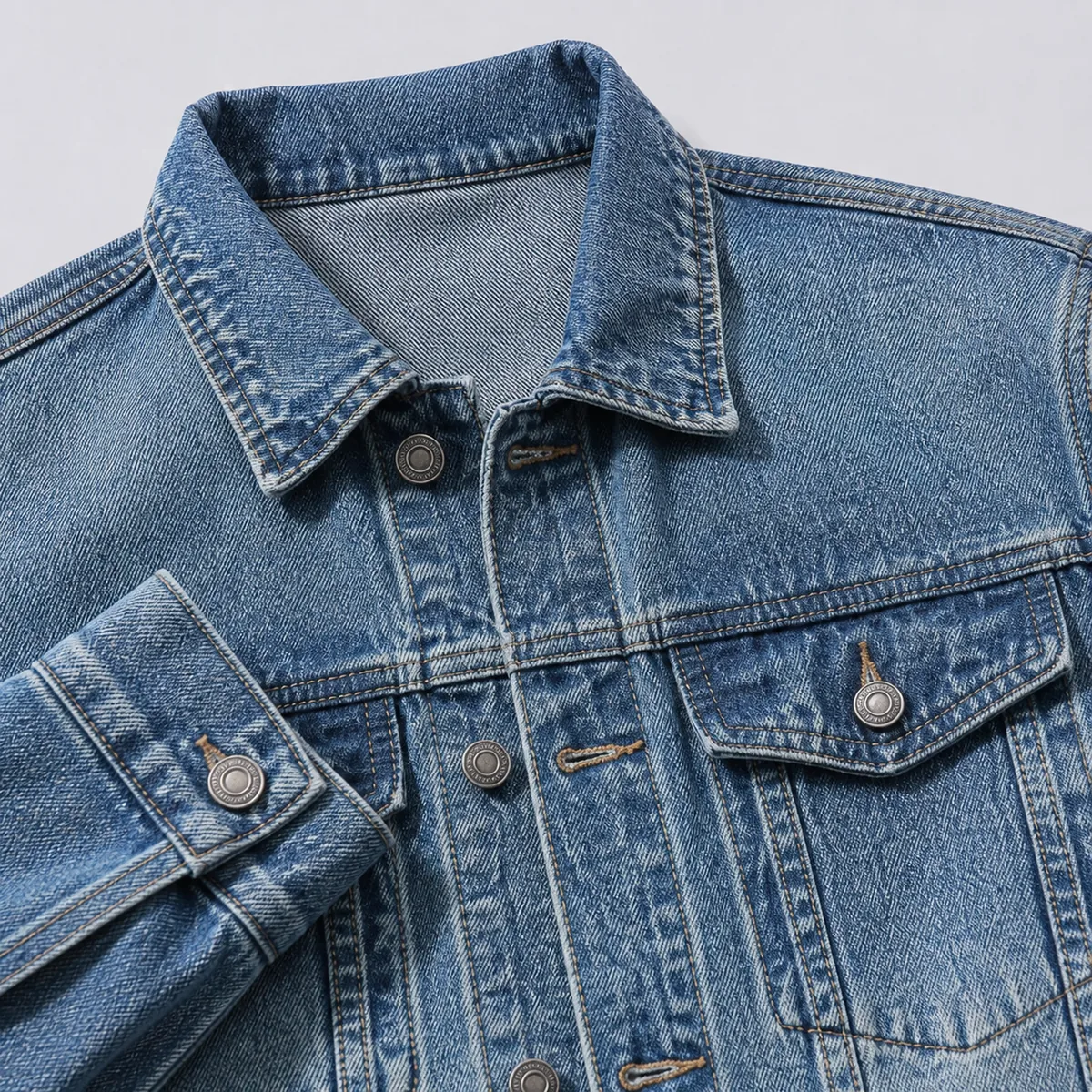Denim shirt-jacket collar, cuff, placket, pockets and button detail