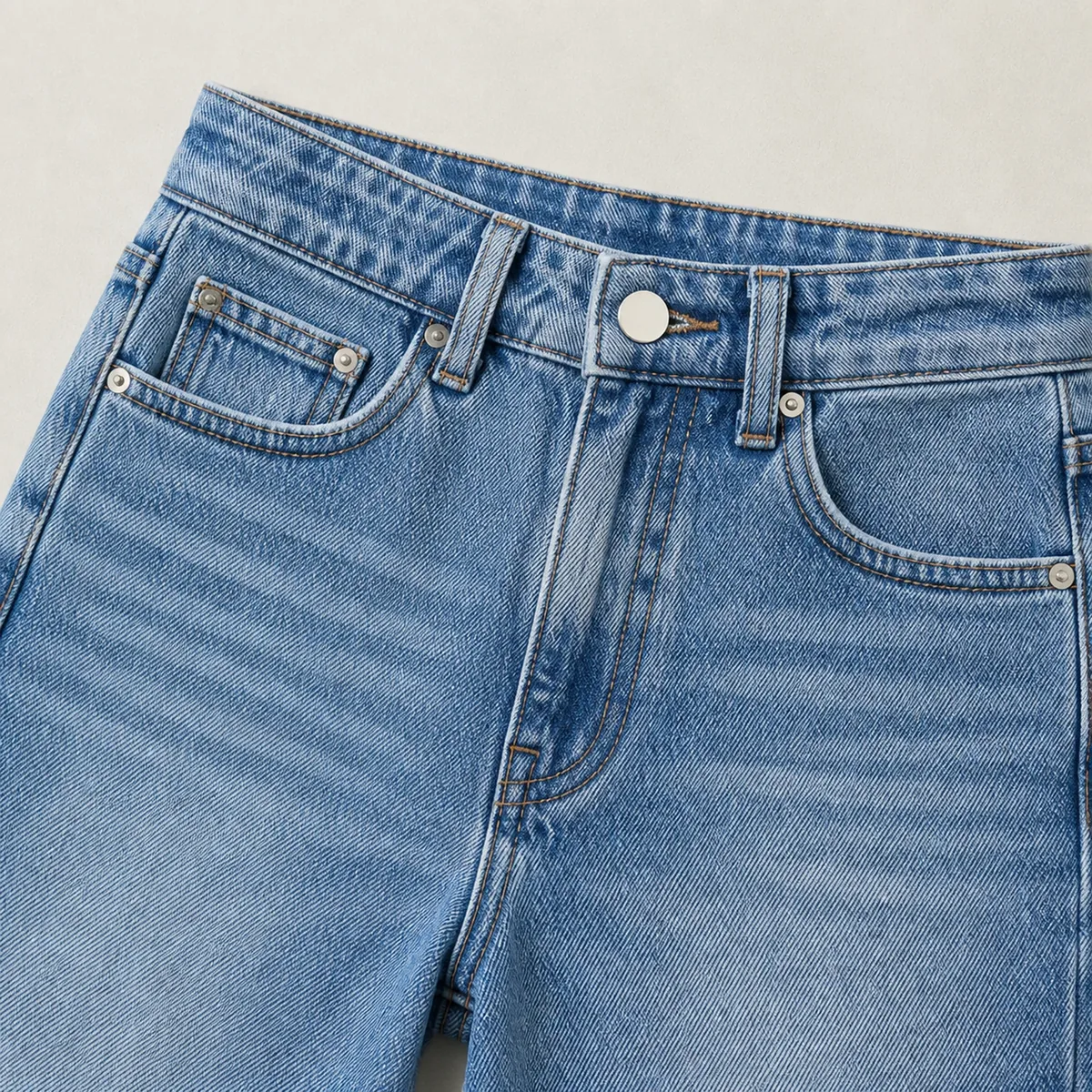 Women's jeans waistband, pocket, button, rivet and fly detail